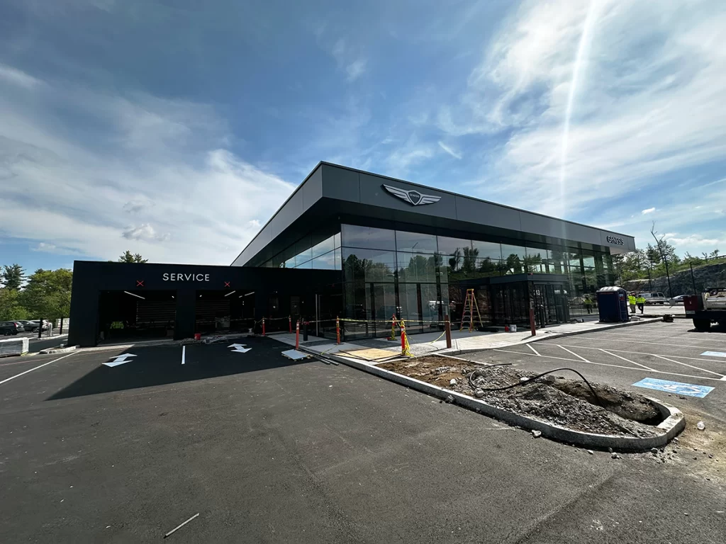 Genesis exterior signage installed at new automotive dealership project