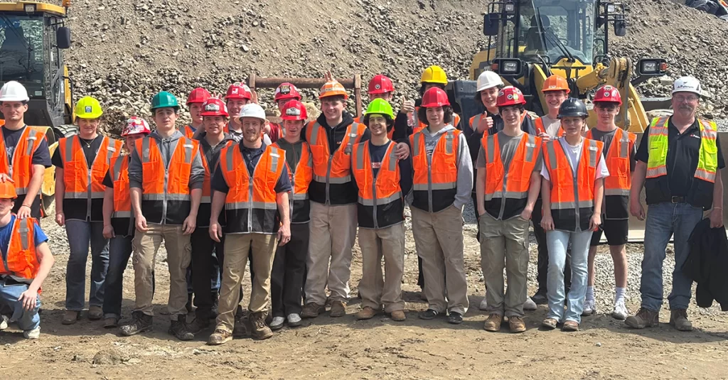 Group shots of students visiting active housing development project in Brookline NH to learn about construction careers