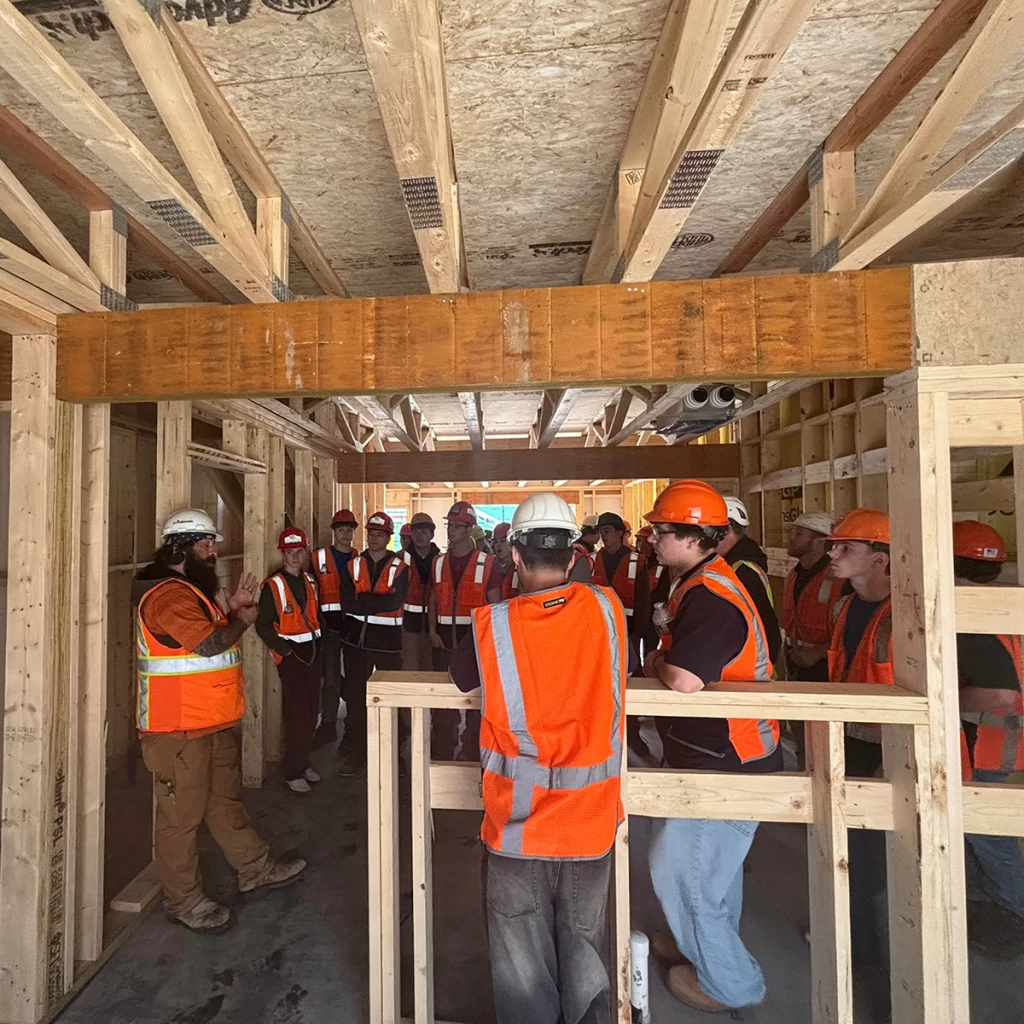 Construction management job site tour for Applied Technology Center students at Brookline Woods