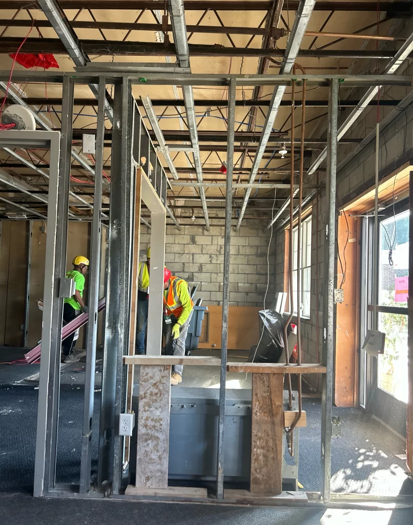 Construction crew performing interior demolition during the Hampstead Hospital lobby renovation
